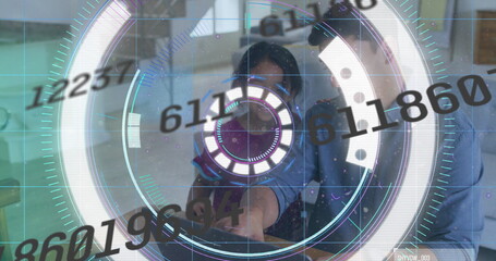 Father and daughter interacting with holographic interface in modern workspace, with stylus