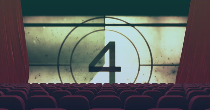 Displaying vintage countdown number 4 on projection screen in theater, with red curtains and seats - Powered by Adobe