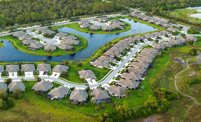 Large residential homes in southwest Florida gated community. American houses in rural US suburbs