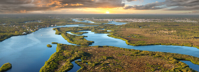 Myakka river wetlands in North Port. Wild tropical nature at sunset. Florida ecosystem landscape