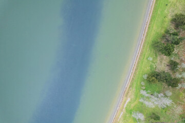 aerial drone top down view Furnas Lake shore in Sao Miguel, Azores archipelago