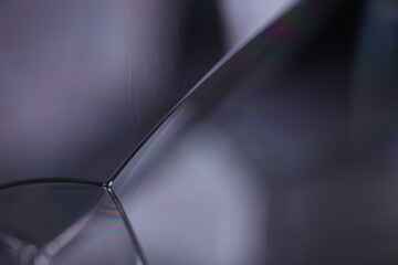 Gray matte liquid, dark minimalistic background, melted aluminium surface, liquid glass effects