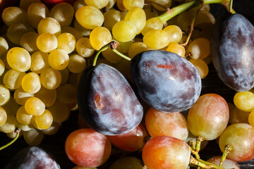 prune plum fruit mix on black background