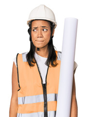 Young Filipino female architect confused, feels doubtful and unsure.