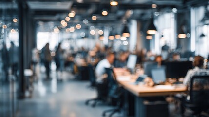 Obraz premium Modern Office Scene with Soft Focus and Blurred Employee Activity