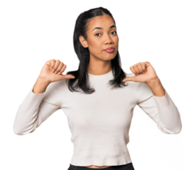 Young Filipina woman feels proud and self confident, example to follow.