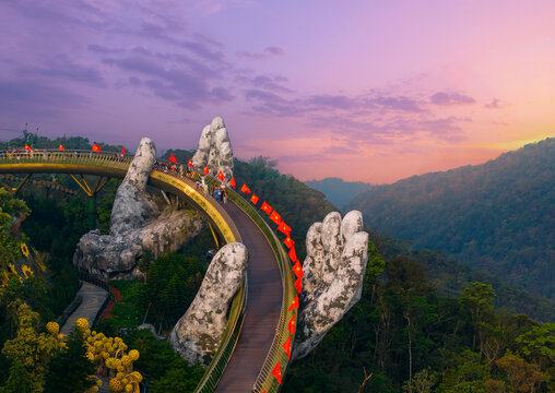 Golden bridge at ba na hills hand of God, sunrise over iconic landmark in Da nang, Vietnam