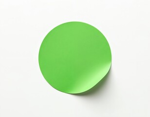 Green circle sticker with folded edge, isolated on white background. Blank round label for message, price tag, sale badge, design template. Adhesive paper surface with copy space. Perfect for