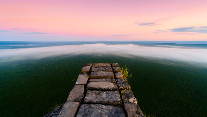 Stone Pathway Cliff Edge Sunrise Pink Sky Misty Forest Landscape image
