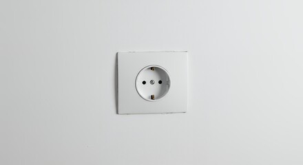 White electrical outlet on a white wall