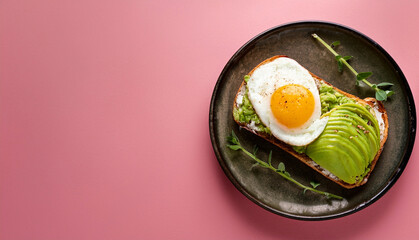 Delicious Avocado Toast with Fried Egg on a Plate