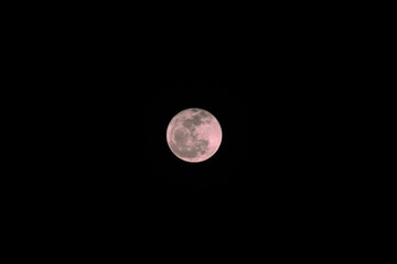 ful moon in a dark sky