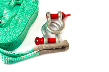 Car towing stop with metal shackles included. Car recovery kit with bow-shaped bracket and towing strap. Copy space