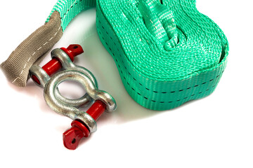 Green towing strap for a car with metal brackets included. Car recovery kit. on a white background.