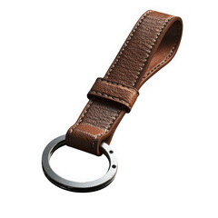 Leather keychain with metal ring isolated on transparent background