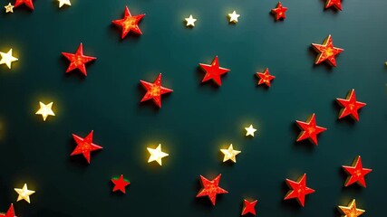 Festive background of sparkling red and yellow star lights on green surface. Christmas stars holiday decorations create magical atmosphere.