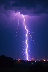 Jagged lightning illuminates torrential rain, stark contrast , clouds, weather