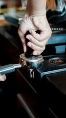Close up of barista prepare to make coffee