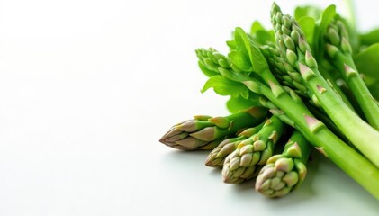 Fresh asparagus and Brussels sprouts on white , green, delicious