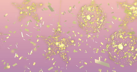 Hanging glitter star ornament on thin strings on pink-lavender backdrop, with spheres and confetti