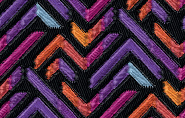 Seamless colorful embroidery zigzag geometric pattern, textile fabric design