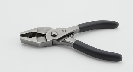 Obraz premium Gray metal pliers on white background