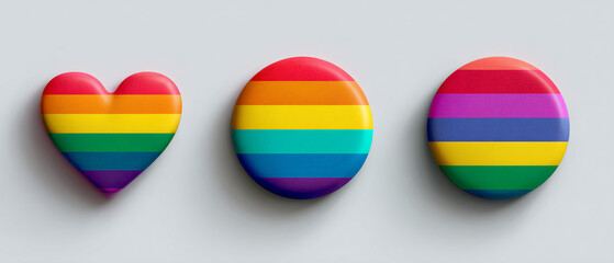 Three rainbow colored shapes on a white background representing lgbtq pride