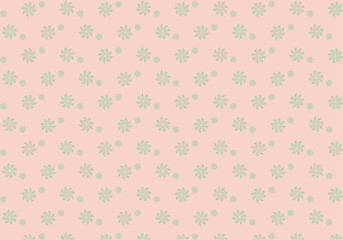 くすみピンクに淡いグリーンの雪の結晶が並ぶシームレスな冬の背景デザイン、優しい配色のパターン素材｜雪の結晶,冬,ピンク,緑,模様,背景