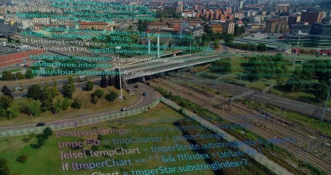 Drone gliding triggers code overlay scrolling across highway ramp and rail tracks for data insight
