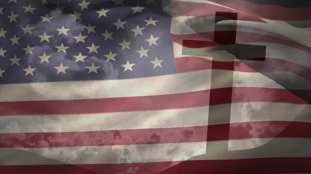 Gentle breeze causing American flag rippling across dim sky while cross silhouette holding position