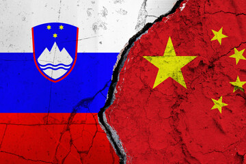 Slovenia and China Split on Textured Surface Symbolizing Collaboration. Torn Flags Between China VS...