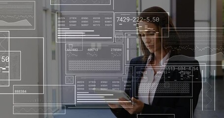 Businesswoman tapping tablet interface and analyzing animated data charts unfolding - Powered by Adobe