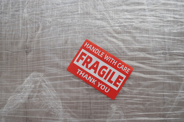Warning sign for fragile items during shipping process