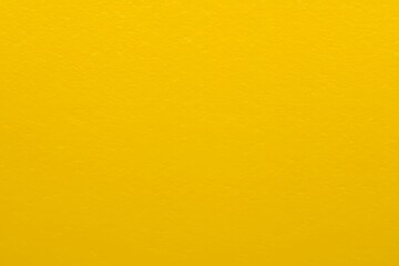 a Solid Yellow background. texture of yellow wall	
