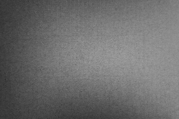 Loft plain simple dark black tone color paint on blank corrugated or cardboard box paper texture...
