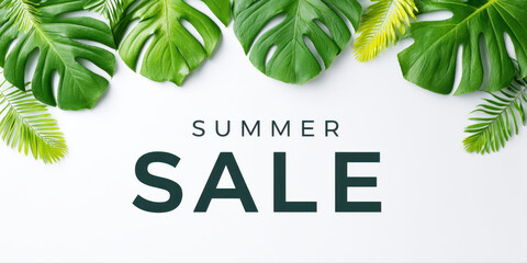 Summer sale banner with tropical green leaves on white background, bright and fresh design for seasonal promotion and marketing