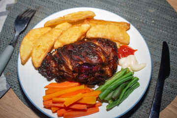 Close-Up of Hot Steak with Veggies and Sauce