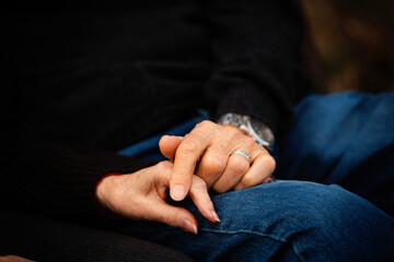 old couple holding hands