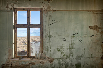 Buildings decay in the ghost mining town at Elizabeth Bay near Luderitz, Namibia.