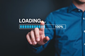 A finger touches a loading bar that displays 100%.