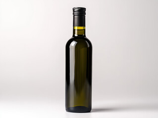 Sleek, dark glass bottle with screw cap stands against neutral background, reflecting light subtly. bottle minimalist design suggests it could be used for olive oil or vinegar
