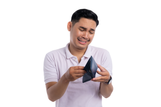 Sad young man looking into an empty wallet with disappointed expression on his face isolated on transparent background