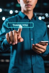 Person pressing a thank you button on a touch screen.