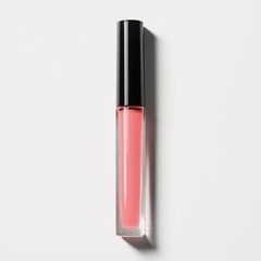 A single tube of light coral lip gloss with a clear rectangular container and a black cap, set against a white background