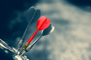 Bulls eye target or bullseye have red dart arrows throw hitting challenge the center of a shooting...