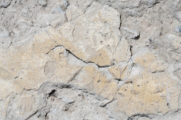 Weathered shabby cracked rock stone surface macro