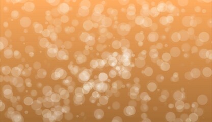 Soft floating light particles and motion blur on a warm orange background with dreamy glow