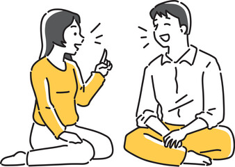 Obraz premium 座って楽しく会話するカップル