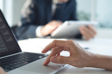 Business meeting in company.  Businessman in office using laptop computer and digital tablet. Collaboration, technology and business workers, men or employees planning sales marketing