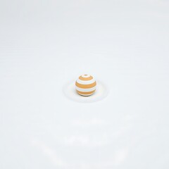 Striped orange and white sphere isolated on white background